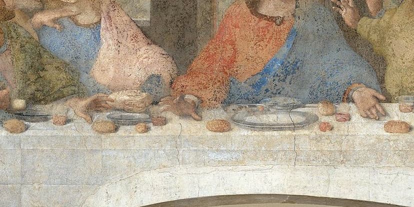Son Akşam Yemeği, masadaki eller: Yahuda'nın kese tutan eli ve İsa'nın açık eli